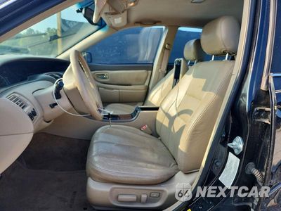 Zdjęcie 7 z 12 samochodu: 2000 TOYOTA AVALON XLS VIN:4T1BF28B1YU080191 - miniatura