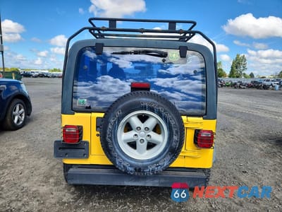 Zdjęcie 6 z 12 samochodu: 2000 JEEP WRANGLER / TJ SPORT VIN:1J4FA49S2YP744845 - miniatura