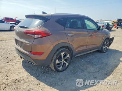 Trzecie zdjęcie samochodu z tyłu: 2016 HYUNDAI TUCSON LIMITED VIN:KM8J33A24GU028895 - miniatura