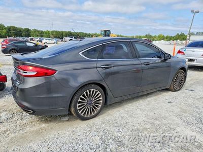 Trzecie zdjęcie samochodu z tyłu: 2017 FORD FUSION TITANIUM VIN:3FA6P0K92HR116402 - miniatura