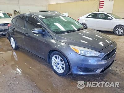 Czwarte zdjęcie samochodu z boku: 2017 FORD FOCUS SE VIN:1FADP3K29HL249863 - miniatura