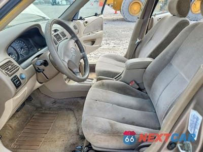 Zdjęcie 7 z 13 samochodu: 2001 TOYOTA COROLLA LE VIN:2T1BR12E01C506416 - miniatura