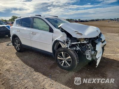 Czwarte zdjęcie samochodu z boku: 2018 TOYOTA RAV4 XLE VIN:JTMRFREV9JJ198801 - miniatura