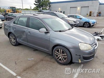 Czwarte zdjęcie samochodu z boku: 2005 VOLKSWAGEN NEW JETTA 2.5L OPTION PACKAGE 1 VIN:3VWSG71K35M639620 - miniatura