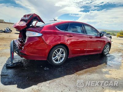 Trzecie zdjęcie samochodu z tyłu: 2016 FORD FUSION SE HYBRID VIN:3FA6P0LU4GR306266 - miniatura