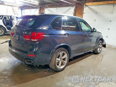 Trzecie zdjęcie samochodu z tyłu: 2018 BMW X5 XDR40E VIN:5UXKT0C50J0V99019 - miniatura