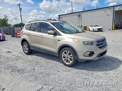 Czwarte zdjęcie samochodu z boku: 2017 FORD ESCAPE SE VIN:1FMCU9GD1HUC57702 - miniatura