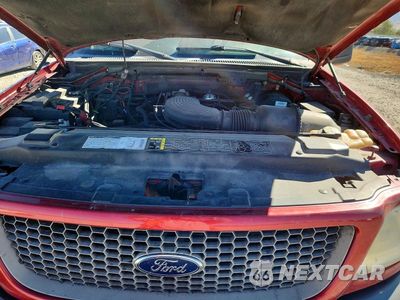 Zdjęcie 11 z 12 samochodu: 2002 FORD F150 VIN:1FTRX18L62NB00200 - miniatura