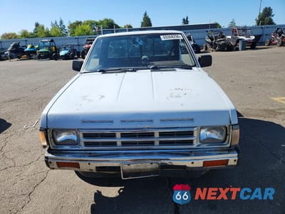 Piąte zdjęcie samochodu w środku: 1992 NISSAN TRUCK BASE VIN:1N6SD11S5NC326849 - miniatura
