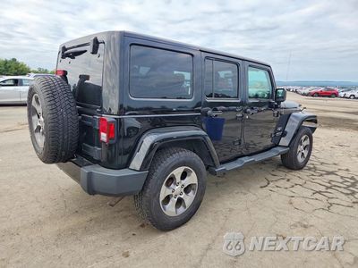 Trzecie zdjęcie samochodu z tyłu: 2017 JEEP WRANGLER UNLIMITED SAHARA VIN:1C4BJWEG6HL591153 - miniatura