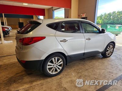 Trzecie zdjęcie samochodu z tyłu: 2013 HYUNDAI TUCSON LIMITED VIN:KM8JUCAC8DU745141 - miniatura