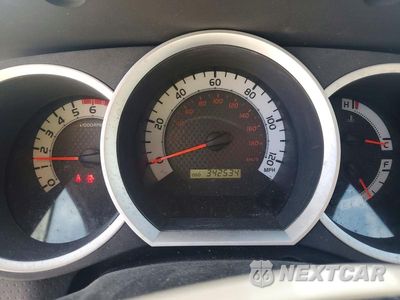 Zdjęcie 9 z 12 samochodu: 2015 TOYOTA TACOMA V6 VIN:3TMLU4EN8FM194621 - miniatura