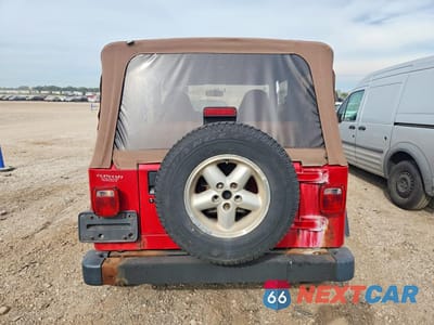 Zdjęcie 6 z 13 samochodu: 2000 JEEP WRANGLER / TJ SPORT VIN:1J4FA49S8YP799445 - miniatura