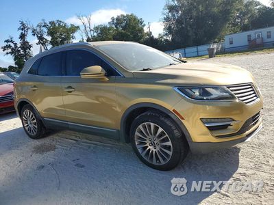 Czwarte zdjęcie samochodu z boku: 2015 LINCOLN MKC VIN:5LMCJ1A92FUJ04254 - miniatura