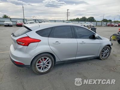 Trzecie zdjęcie samochodu z tyłu: 2017 FORD FOCUS SE VIN:1FADP3K26HL343666 - miniatura