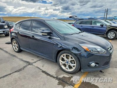 Czwarte zdjęcie samochodu z boku: 2012 FORD FOCUS SEL VIN:1FAHP3M2XCL400295 - miniatura