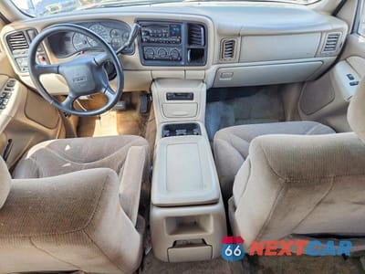Zdjęcie 8 z 13 samochodu: 2002 GMC YUKON XL C1500 VIN:1GKEC16Z72J262494 - miniatura