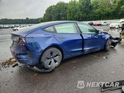 Trzecie zdjęcie samochodu z tyłu: 2023 TESLA MODEL 3 VIN:5YJ3E1EB8PF621609 - miniatura