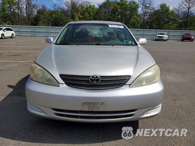 Piąte zdjęcie samochodu w środku: 2003 TOYOTA CAMRY LE VIN:JTDBE32K130170897 - miniatura