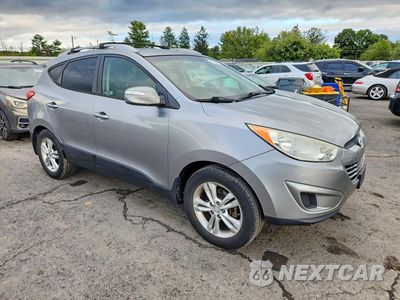 Czwarte zdjęcie samochodu z boku: 2012 HYUNDAI TUCSON GLS VIN:KM8JU3ACXCU516863 - miniatura