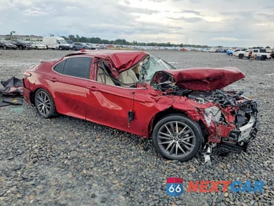 Czwarte zdjęcie samochodu z boku: 2022 TOYOTA CAMRY XLE VIN:4T1F31AK1NU585576 - miniatura