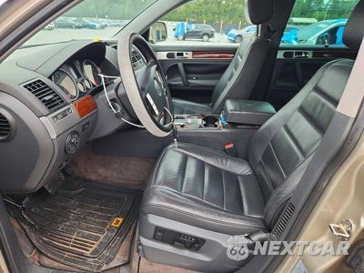 Zdjęcie 7 z 13 samochodu: 2004 VOLKSWAGEN TOUAREG 3.2 VIN:WVGBC67L94D035813 - miniatura