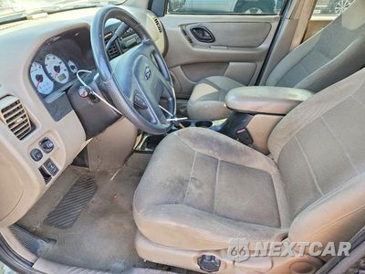 Zdjęcie 7 z 13 samochodu: 2001 FORD ESCAPE XLT VIN:1FMYU04121KC37679 - miniatura