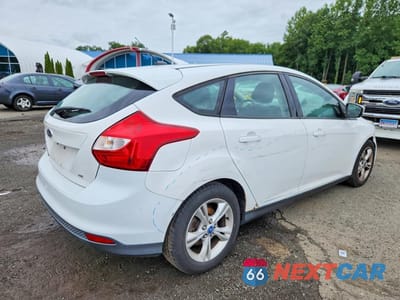 Trzecie zdjęcie samochodu z tyłu: 2012 FORD FOCUS SE VIN:1FAHP3K29CL296868 - miniatura