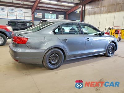 Trzecie zdjęcie samochodu z tyłu: 2014 VOLKSWAGEN JETTA BASE VIN:3VW1K7AJ1EM370650 - miniatura
