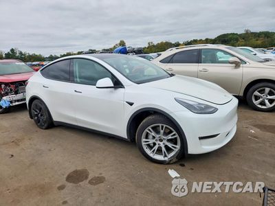Czwarte zdjęcie samochodu z boku: 2023 TESLA MODEL Y VIN:7SAYGAEE0PF607796 - miniatura