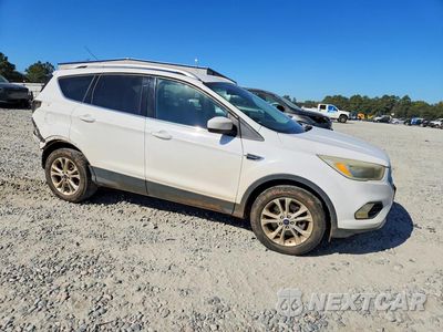Czwarte zdjęcie samochodu z boku: 2017 FORD ESCAPE SE VIN:1FMCU9G98HUC81510 - miniatura