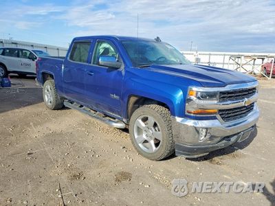 Czwarte zdjęcie samochodu z boku: 2018 CHEVROLET SILVERADO K1500 LT VIN:3GCUKREC0JG511594 - miniatura