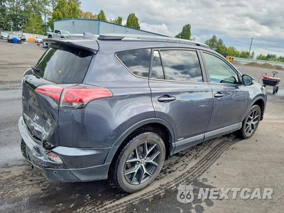 Trzecie zdjęcie samochodu z tyłu: 2018 TOYOTA RAV4 HV SE VIN:JTMJJREV7JD192456 - miniatura