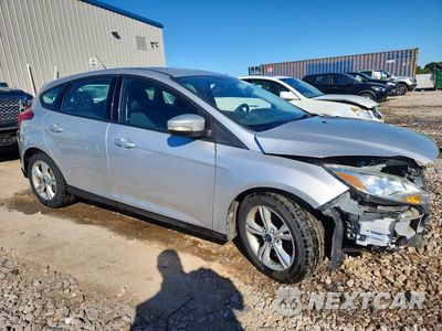 Czwarte zdjęcie samochodu z boku: 2014 FORD FOCUS SE VIN:1FADP3K29EL339591 - miniatura