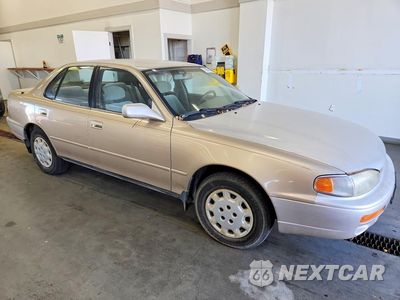Czwarte zdjęcie samochodu z boku: 1996 TOYOTA CAMRY LE VIN:JT2BG12K7T0362669 - miniatura