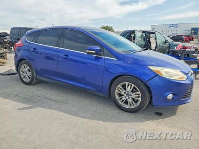 Czwarte zdjęcie samochodu z boku: 2012 FORD FOCUS SEL VIN:1FAHP3M2XCL373888 - miniatura