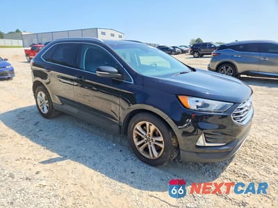Czwarte zdjęcie samochodu z boku: 2020 FORD EDGE SEL VIN:2FMPK4J94LBA58897 - miniatura