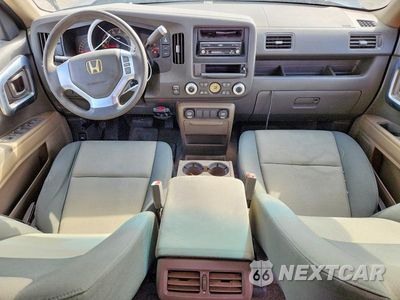 Zdjęcie 8 z 12 samochodu: 2006 HONDA RIDGELINE RT VIN:2HJYK16246H529544 - miniatura
