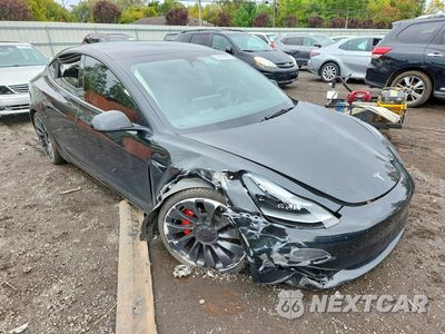Czwarte zdjęcie samochodu z boku: 2023 TESLA MODEL 3 VIN:5YJ3E1EC9PF618064 - miniatura