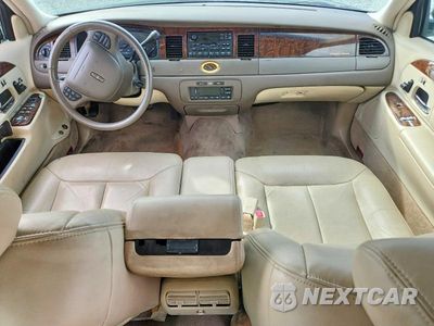 Zdjęcie 8 z 12 samochodu: 1999 LINCOLN TOWN CAR CARTIER VIN:1LNHM83W5XY621098 - miniatura