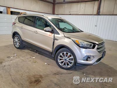 Czwarte zdjęcie samochodu z boku: 2017 FORD ESCAPE TITANIUM VIN:1FMCU9J91HUA92710 - miniatura