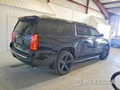 Trzecie zdjęcie samochodu z tyłu: 2016 CHEVROLET SUBURBAN K1500 LTZ VIN:1GNSKJKC6GR315365 - miniatura