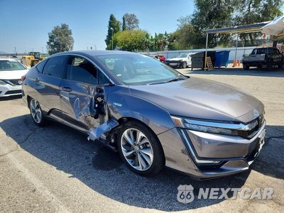 Czwarte zdjęcie samochodu z boku: 2018 HONDA CLARITY VIN:JHMZC5F13JC023279 - miniatura