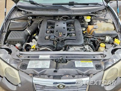 Zdjęcie 11 z 12 samochodu: 2004 CHRYSLER 300M VIN:2C3HE66GX4H691135 - miniatura