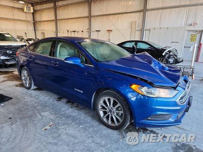 Czwarte zdjęcie samochodu z boku: 2017 FORD FUSION SE HYBRID VIN:3FA6P0LU0HR144587 - miniatura