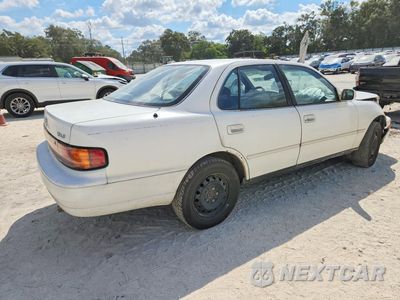 Trzecie zdjęcie samochodu z tyłu: 1994 TOYOTA CAMRY LE V6 VIN:4T1GK12E3RU856353 - miniatura