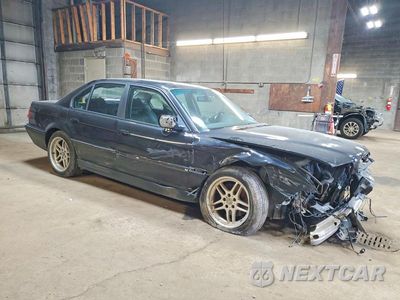 Czwarte zdjęcie samochodu z boku: 1999 BMW 740 I AUTOMATIC VIN:WBAGG8333XDN73330 - miniatura