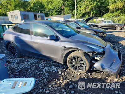 Czwarte zdjęcie samochodu z boku: 2023 TESLA MODEL Y VIN:7SAYGDEE3PF694241 - miniatura