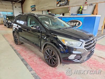 Czwarte zdjęcie samochodu z boku: 2017 FORD ESCAPE TITANIUM VIN:1FMCU9JD7HUC89708 - miniatura