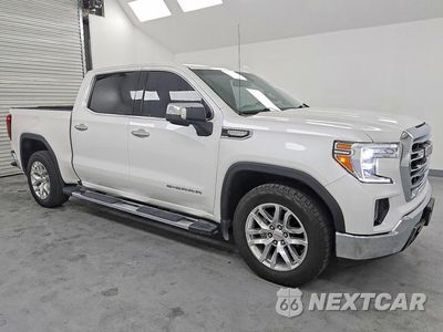 Czwarte zdjęcie samochodu z boku: 2021 GMC SIERRA C1500 SLT VIN:3GTP8DET6MG404214 - miniatura